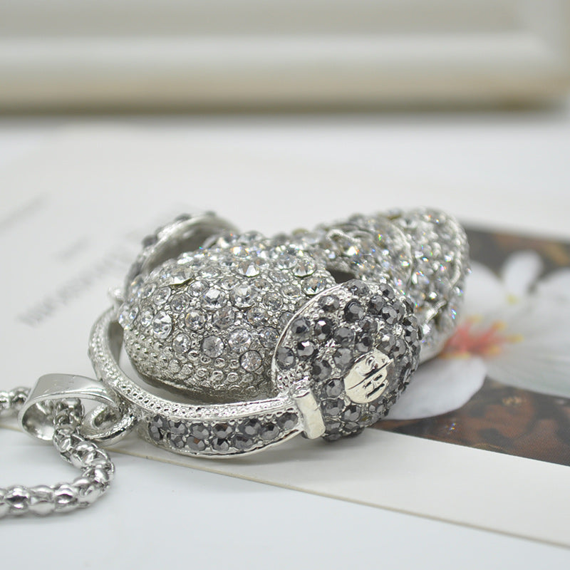 Skull headphones necklace